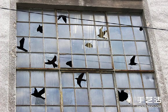 艺术家的幽默 让废弃建筑物的破窗不再可怕