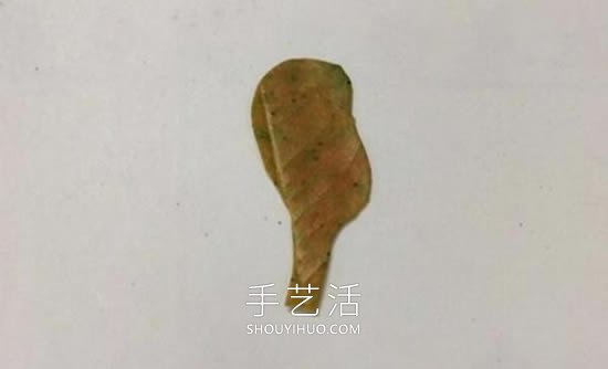 树叶粘贴画人物穿裙子怎么做的过程图解