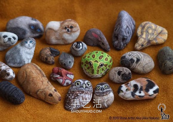 将普通的石头DIY成可爱手掌大小的动物