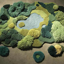 利用绿色毛线织成的自然系地毯 看起来超舒服