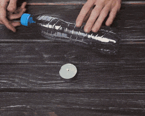 简单塑料瓶废物利用做手工的方法图片