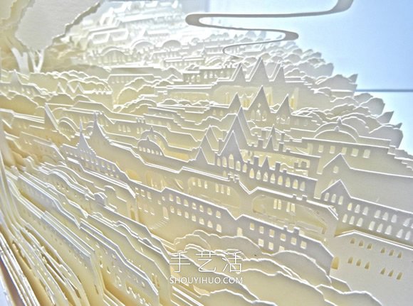 由数十张纸制作而成的立体城市和森林纸雕