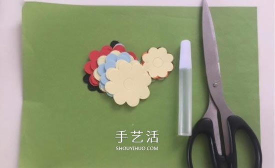 送给老师的花：幼儿手工剪纸漂亮花丛图解