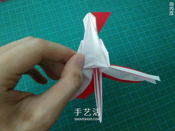 圣诞鹤的折法图解教程 折纸圣诞纸鹤的方法