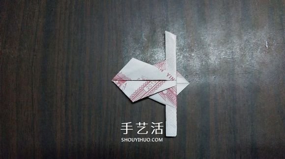 五瓣莲的折纸方法图解 纸币折五瓣莲的步骤