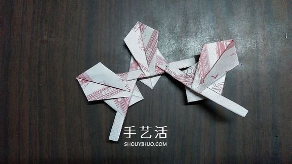 五瓣莲的折纸方法图解 纸币折五瓣莲的步骤