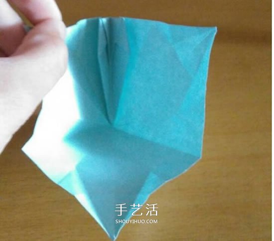 怎么折漂亮纸花 手工折纸八角星花的折法图解
