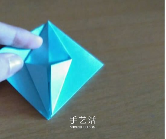 怎么折漂亮纸花 手工折纸八角星花的折法图解