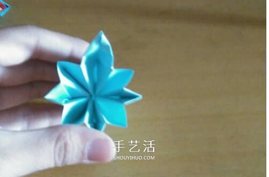 怎么折漂亮纸花 手工折纸八角星花的折法图解