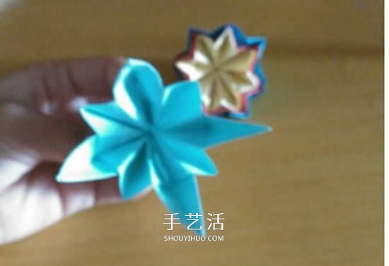 怎么折漂亮纸花 手工折纸八角星花的折法图解