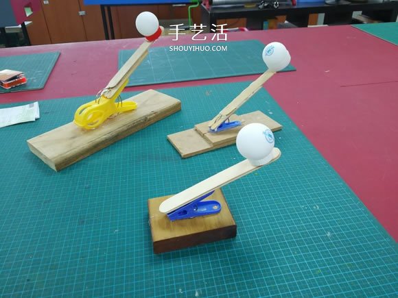 用衣夹制作投石车弹射器玩具的DIY教程